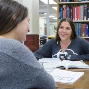 Two students study for Italian class