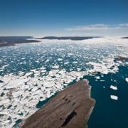 Icebergs choke the fjord where Jakobshavn glacier flows into the sea off western Greenland