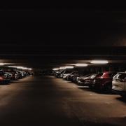 A dimly-lit parking lot