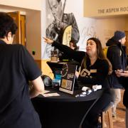 Student visiting the Career Services booth at a fair