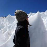 Lara Vimercati examines a nieves penitentes structure on Volcán Llullaillaco in Chile