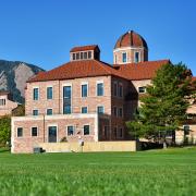 Leeds School of Business agains the background of the Flatirons