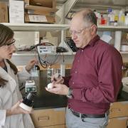 Professor Karl Linden, right, in his laboratory at CU Boulder