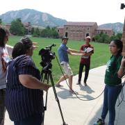 Students filming something on campus