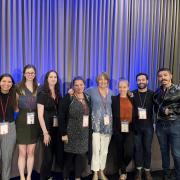 Students and faculty pose with Professor Martha Palmer at the 2023 ACL conference