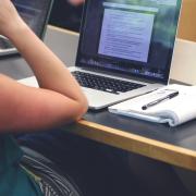 Girl working on Mac computer