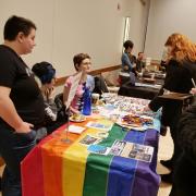 Students check out the Gender and Sexuality Center booth 