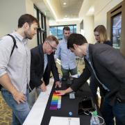 Attendees check out products at the 2018 New Venture Challenge Kickoff