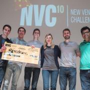 Specdrums team poses with first-place check of $75,000