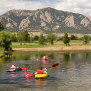 Kayakers with the Flatirons in the background