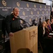 Gov. Jared Polis addresses the audience at the Conference on World Affairs