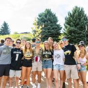 Group of students posing for photo outside