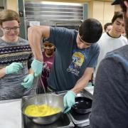 Students improve their cooking skills at Ralphie's Cooking Basics