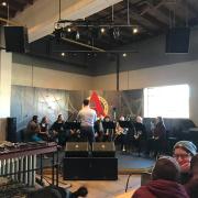 Musicians performing at Rayback Collective