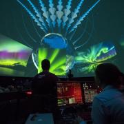 Technicians during a Fiske Planetarium laser show