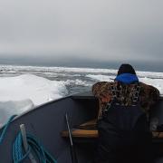 Researcher in boat on the Bering Sea