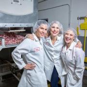 Smarties Candy Company co-president Jessica Dee Sawyer, left, with her sister Liz and cousin Sarah Dee.