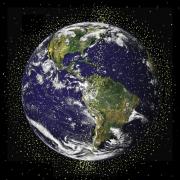 Image of the globe surrounded by satellites