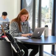 Student studying in library.