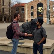 Student veterans shaking hands