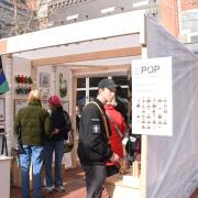 Environmental Design students selling products at their pop-up shop