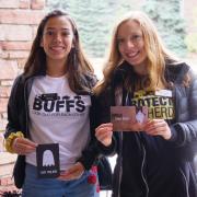 Two female students standing near the University Memorial Center at CU Boulder