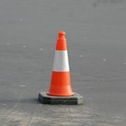 A stock image of an orange traffic cone