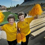 Twins Peggy Coppom, left, and Betty Hoover. (Photo by Glenn Asakawa/University of Colorado)