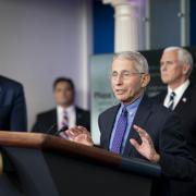 Anthony Fauci and Donald Trump at a WH Press Briefing