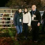 Chancellor Phillip DiStefano, right, poses with his wife, Yvonne, and daughter, Nicole, alongside Ralphie V ahead of Colorado's game against Washington on Saturday, Nov. 23, 2019. (Photo by Glenn Asakawa/University of Colorado)