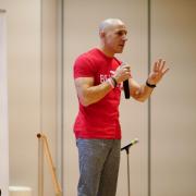 Suicide survivor and prevention advocate Kevin Hines speaks on campus. Photo by Glenn Asakawa.