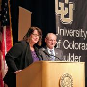 SVC and CFO Kelly Fox and Provost Russ Moore speak at the town hall.