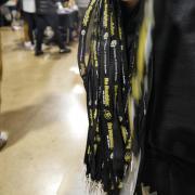 Buff lanyards were handed out to all admitted students. Photo by Glenn Asakawa.