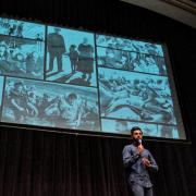 Hasan Minhaj speaks at Macky Auditorium. Photo by Glenn Asakawa.