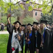 Grads gather at Norlin Quad before the main commencement ceremony. Photo by Glenn Asakawa.