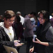 Visitors check out more than 100 student projects on display at the ATLAS expo. Photo by Patrick Campbell.