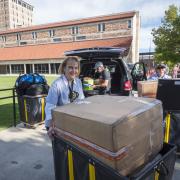 Boulder City Manager Jane Brautigam helping students move in the residence halls