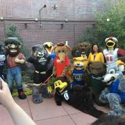 Chip and other mascots from across the state celebrate College Friday with Kim Hunter Reed, , executive director of the Colorado Department of Higher Education. Photo from Colorado Department of Higher Education.