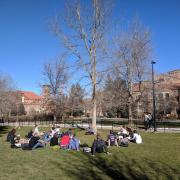 Students enjoy the warm weather at Norlin Quad. Photo by Patrick Campbell.