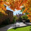 students walking on campus during autumn