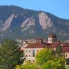 Leeds School of Business building with Flatirons in the background