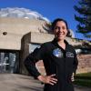 Sarah Gillis in front of Fiske Planetarium