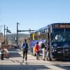 Students loading an RTD bus