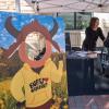Student visits a booth at the Take Care Fair