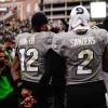 Buffs football players Hunter and Sanders post game.