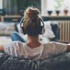 person listening to music on headphones