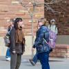 two students talking outside