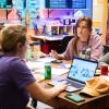 three students participating in the T9 hackathon