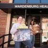 Health Promotion student staff members showcase boxes of naloxone