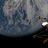 View of the Earth from space with the legs of a spacecraft in the foreground